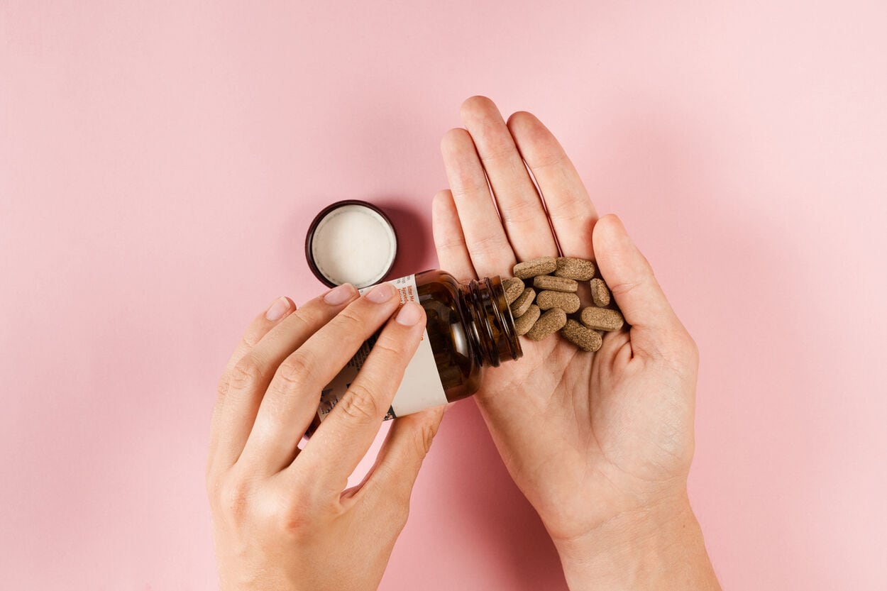 zink tabletten met een roze achtergrond