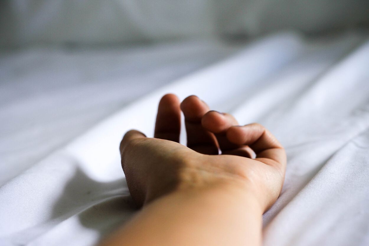 hand in bed